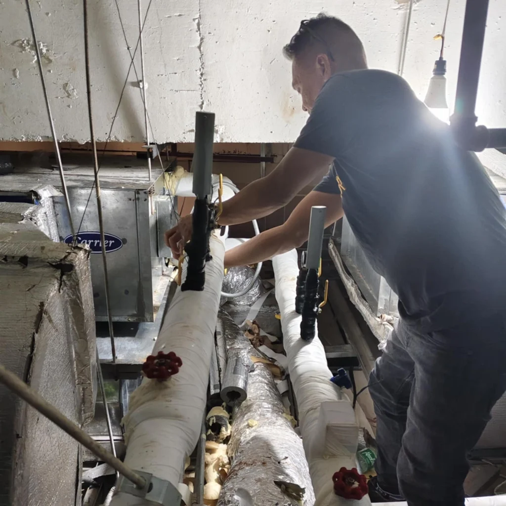 Excel Cool Engineering servicing a chilled water system for optimal cooling efficiency.